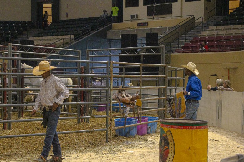 Black cowboys at the BPIR inside of the arena. 