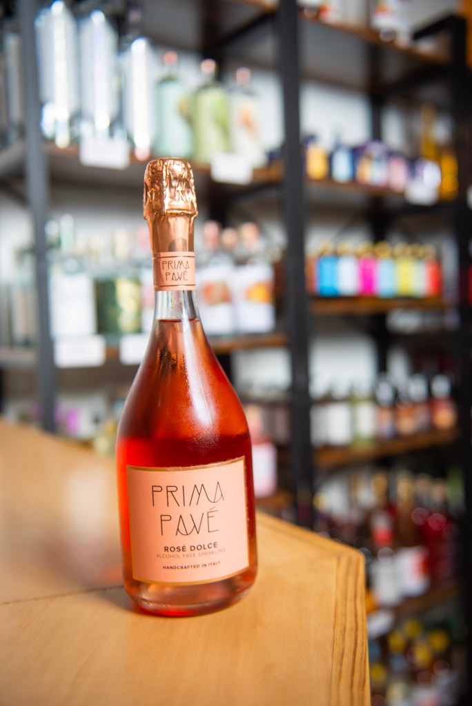 Photograph of a bottle of alcohol free rose. 