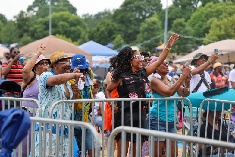 a crowd watches a music performance 