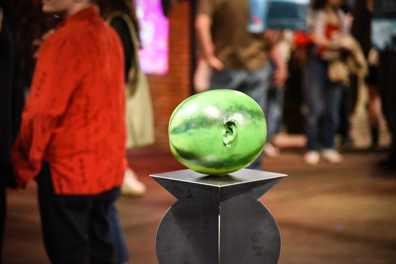 Photo of an abstract work of art on view in an exhibition. 